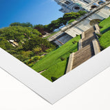 Art deco poster of Paris scenery on rolled canvas with pastel blue and cream tones, suitable for dining room wall art.