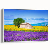 Vintage poster art of a Provence landscape on framed canvas, featuring colorful art in pastel shades.