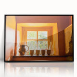 Large abstract wall art depicting a mid-century modernist scene of southern France in muted tones, framed in black acrylic.