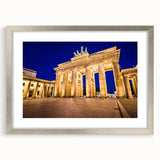 Extra large abstract art print of Berlin scenery in textured gray and blue tones, framed in silver.