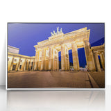 Mid-century modernist art depicting Berlin skyline in muted gray and blue tones on a white framed acrylic print.