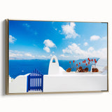 Framed canvas depicting a vintage-style landscape of Santorini with muted blue and white tones, ideal for bedroom wall art.