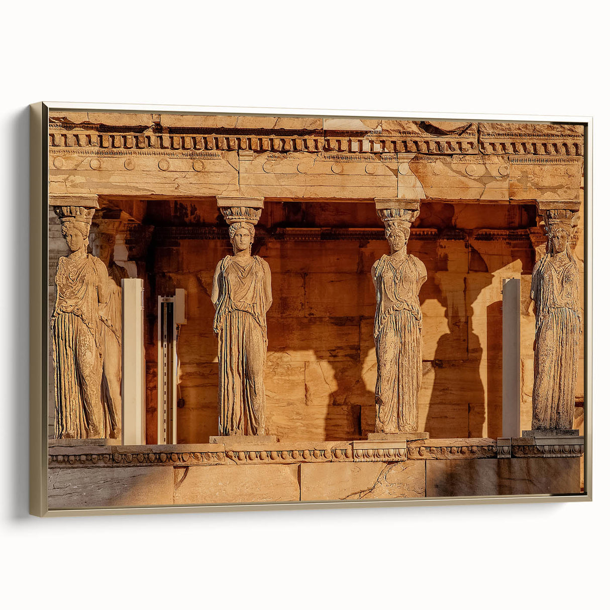 Framed canvas depicting a vintage-style Greek landscape in muted gold and black tones, ideal for bedroom wall decor.