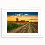 Textured abstract art print depicting a European scenery in muted earth tones, framed with a white mat.