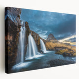 Side view of a stretched canvas featuring a serene Icelandic landscape in cool blue and green tones.