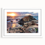 Textured art print depicting an abstract Irish landscape in muted green and blue tones, framed with a white mat.