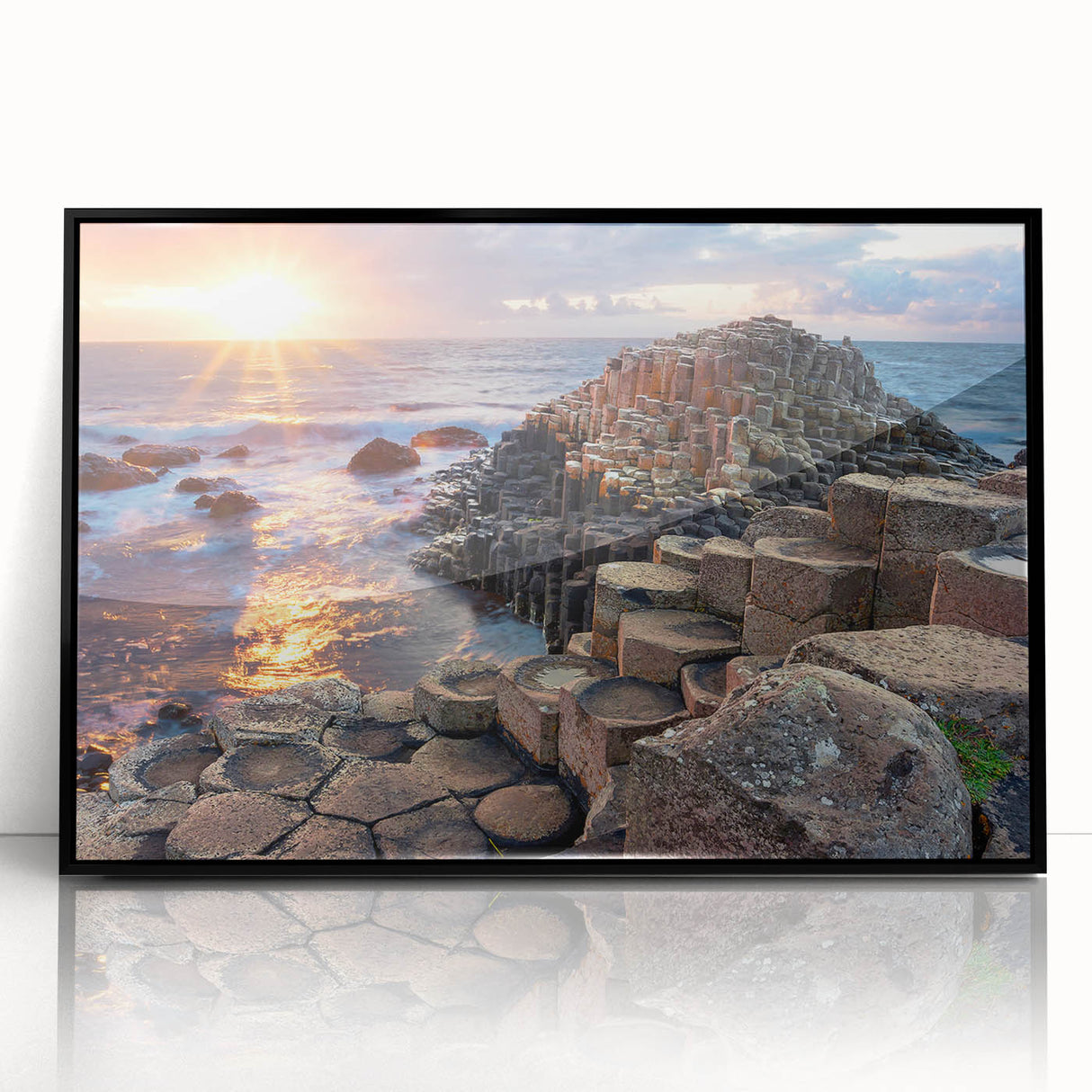 Large abstract wall art depicting a European landscape with muted earth tones on a black framed acrylic.