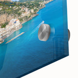 Large abstract depiction of the Amalfi Coast in vibrant blue and green hues on acrylic glass, suitable for dining room art.