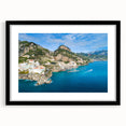 Extra large colorful art print depicting abstract textured scenery of Amalfi Coast in a black frame.