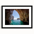 Colorful abstract art print of a European scenery, in a black frame with mat, ideal for living room decor.