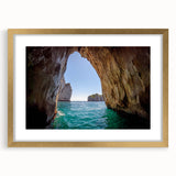 Abstract art print of Capri scenery in muted blue and white tones on a framed canvas, suitable for dining room decor.