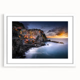 Abstract art print of Cinque Terre with vivid blue and green tones, framed in white, ideal for dining room decor.