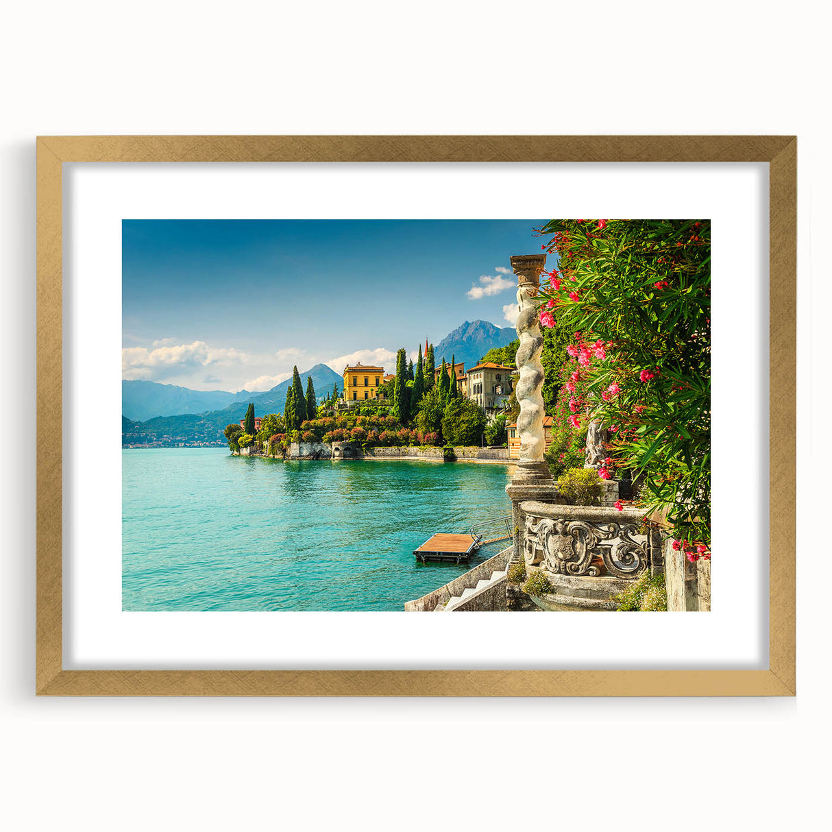 Abstract art print of Lake Como with muted blue and green hues on a framed gold mat, suitable for dining room decor.