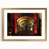 Abstract art print of Naples with muted gold and blue tones, framed with a gold mat, suitable for dining room decor.