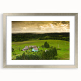 Extra large abstract art print depicting a textured European scenery in muted earth tones, framed in silver.