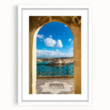 Textured abstract art print of a European Malta scenery in muted earth tones, framed with a white mat.