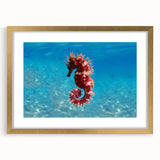 Abstract art print of the Mediterranean Sea in muted blue and white tones, framed in gold, ideal for dining room decor.