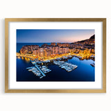 Abstract art print of Monaco scenery in muted gold and blue tones on a framed canvas, suitable for dining room decor.