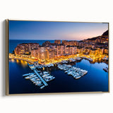 Framed canvas featuring a vintage-style landscape painting of Monaco, with black and gold tones.