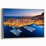 Framed canvas of a vintage Monaco landscape with colorful buildings and a black sky, ideal for living room decor.