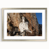 Extra large abstract art print depicting a textured Montenegro scenery in muted earth tones, framed in silver.