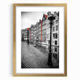 Abstract art print of Amsterdam with muted blue and orange hues on a framed gold canvas, suitable for dining room decor.