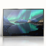 Large art print of a serene Norwegian landscape in muted greens and blues on a silver-framed acrylic.