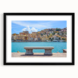 Colorful abstract art print of Porto's landscape in vibrant hues on a large textured canvas, framed in black.