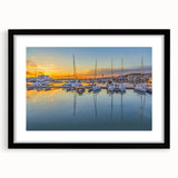 Abstract art print of a colorful, textured European scenery on a large black-framed canvas, ideal for living room decor.