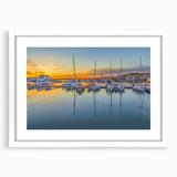 Textured abstract art print depicting a European scenery in muted earth tones, framed with a white mat.