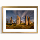 Abstract art print of a European Scotland scenery in muted earth tones, framed in gold, suitable for dining room decor.