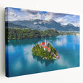 Scenic view of a Slovenian landscape on a large stretched canvas, featuring green fields and blue skies.