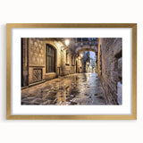 Abstract art print of Barcelona scenery in muted gold and blue tones, framed with a gold mat, suitable for dining room decor.