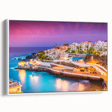 Vintage poster art of a scenic European landscape in vibrant colors on a framed canvas, ideal for living room decor.