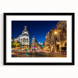 Extra large colorful abstract art print of Madrid scenery on textured canvas, framed in black, ideal for living room decor.