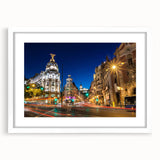 Abstract art print of Madrid skyline in muted earth tones on a framed white mat, ideal for dining room decor.