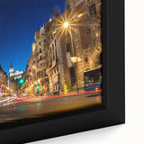 Extra large black wall art featuring a textured Madrid city scene in vibrant colors on framed canvas.