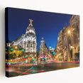 Large canvas print depicting the bustling streets of Madrid in muted earth tones, ideal for kitchen wall art.