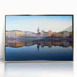 Mid-century modernist art of Stockholm skyline in muted blue and grey tones on a framed acrylic print.