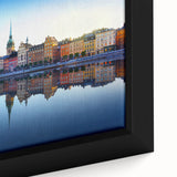 Extra large framed canvas featuring a textured depiction of Stockholm's skyline in black with colorful accents.