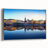 Landscape art painting of Stockholm featuring colorful buildings on canvas, framed in silver, ideal for living room decor.