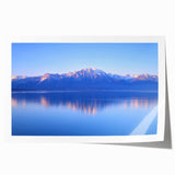 Extra large rolled print of Geneva scenery with floral elements in pastel shades.