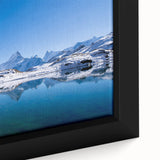 Close-up of a textured, extra large black wall art depicting a colorful Swiss landscape on framed canvas.