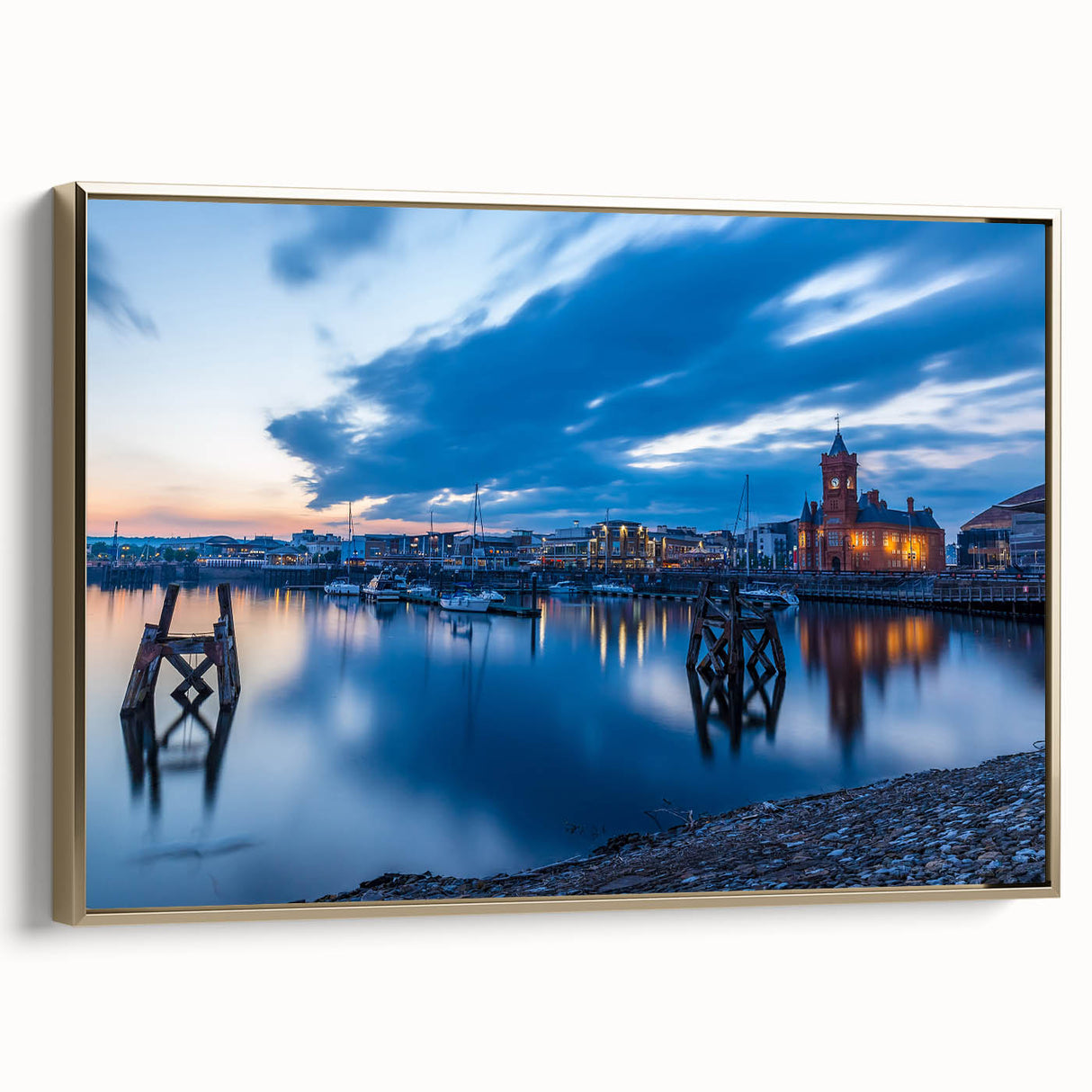 Framed canvas wall art depicting a vintage-style Welsh landscape in muted gold and black tones, ideal for bedroom decor.