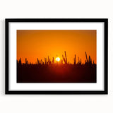 Extra large abstract art print of Baja California scenery in vibrant colors on a textured canvas, framed in black.