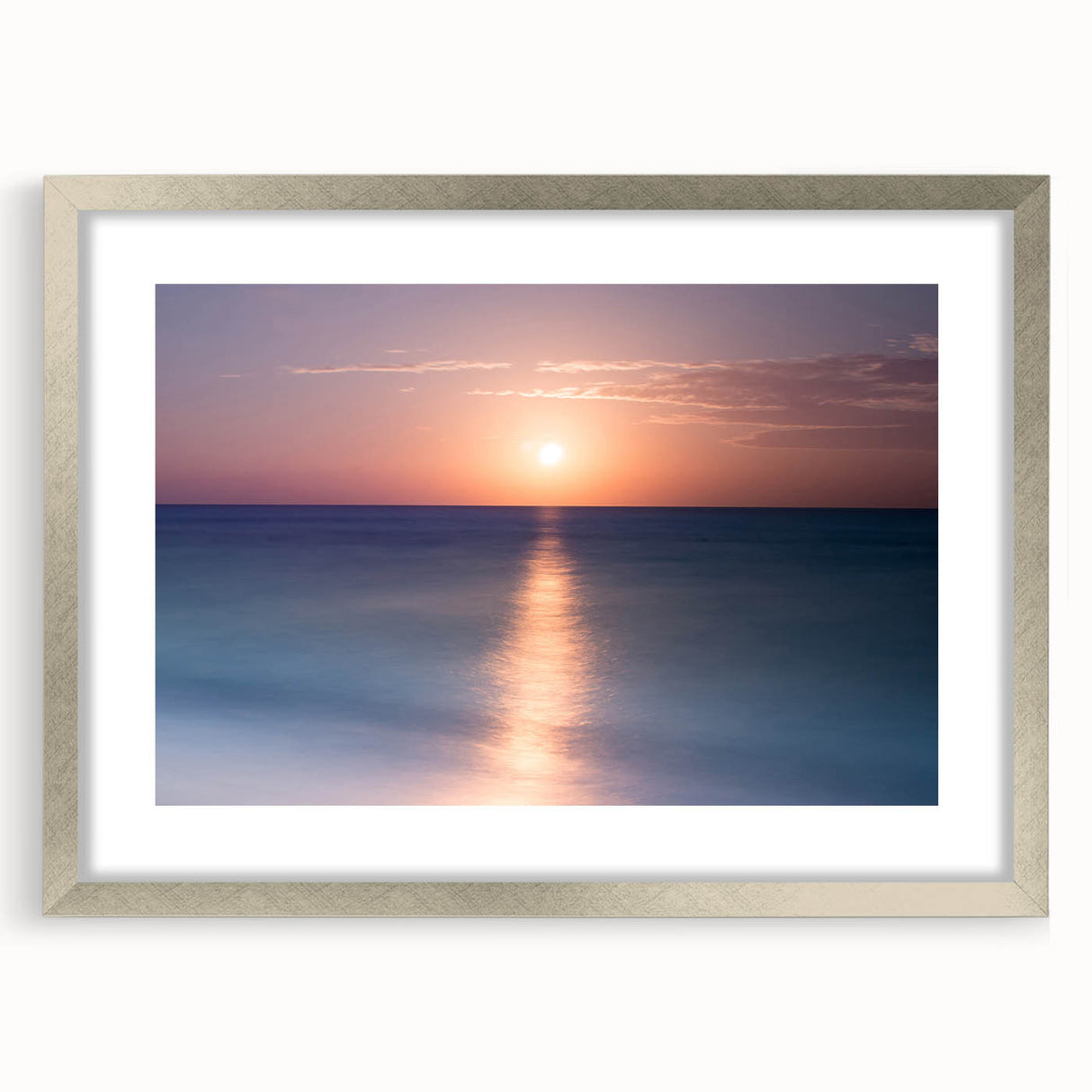 Textured abstract art print of Cancun scenery in muted blue and green tones, framed in silver, ideal for bedroom art.