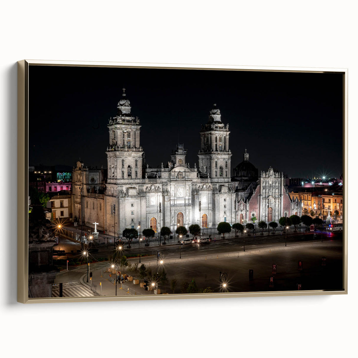 Framed canvas featuring a vintage-style landscape painting of Mexico City in black and gold tones.