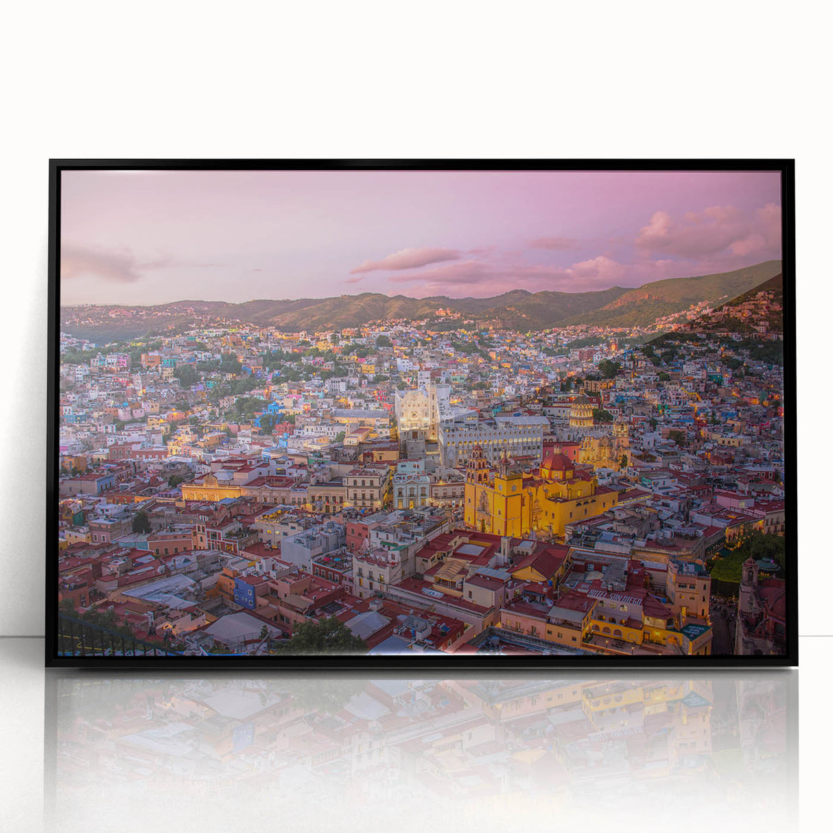 Large abstract wall art depicting Guanajuato, Mexico, in vibrant colors on a black framed acrylic, suitable for modern decor.