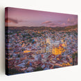 Side view of a stretched canvas depicting the colorful buildings of Guanajuato, Mexico, ideal for kitchen wall art.