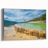 Framed canvas depicting a vintage-style landscape of Oaxaca with colorful art elements, ideal for enhancing a living room.